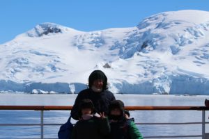 Children in Antarctica. Andrea and Mattia with Laura mom during the cruise to Antarctica. Author and Copyright Marco Ramerini