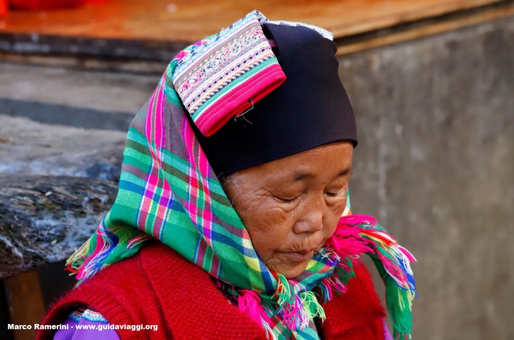 Woman, Zhoucheng, Yunnan, China. Author and Copyright Marco Ramerini ,.