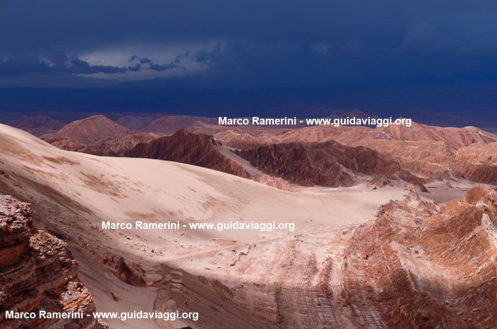 Storm clouds over the Atacama desert landscape. Valle di Marte (Valle de Marte) and the Cordillera de la Sal, Atacama Desert, Chile. Author and Copyright Marco Ramerini