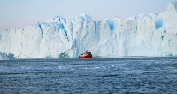 Boat in the ice, Greenland. Author and Copyright Marco Ramerini