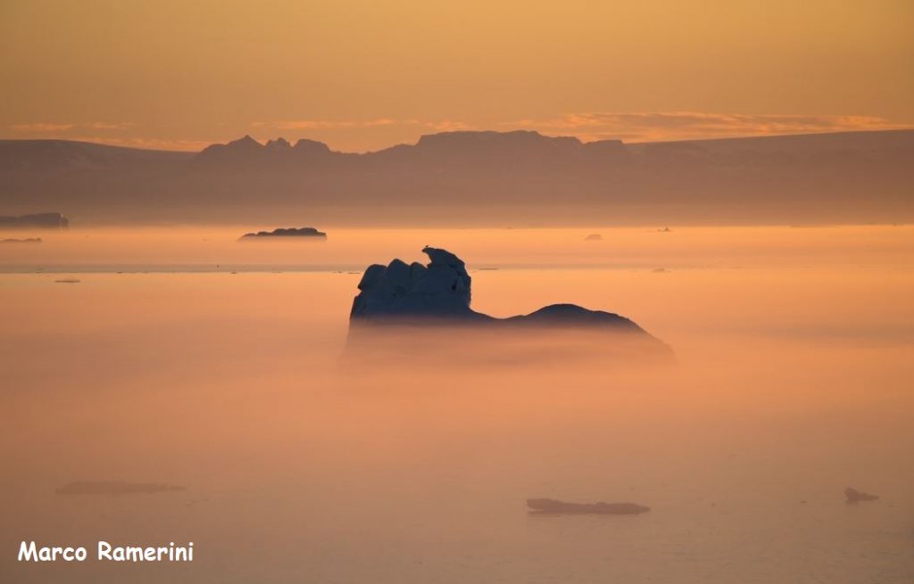 The warm light of the midnight sun, Greenland. Author and Copyright Marco Ramerini